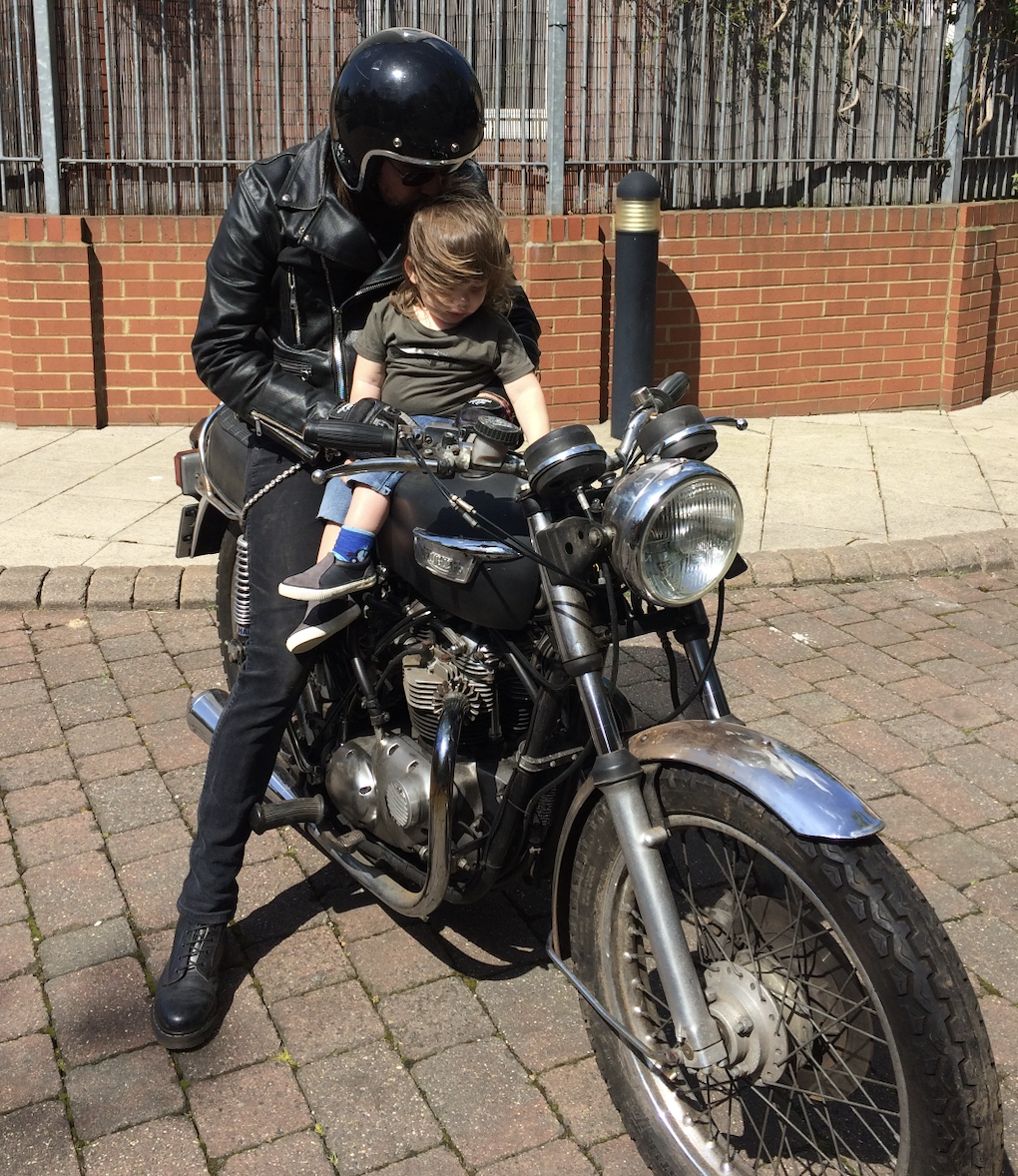 A Honda Fireblade with a young pillion